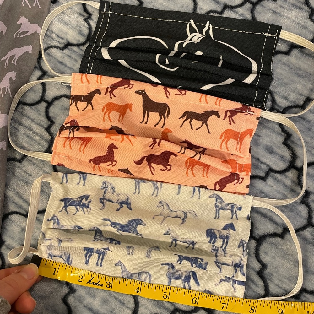 Girls horse masks (3) and neck gator (1)